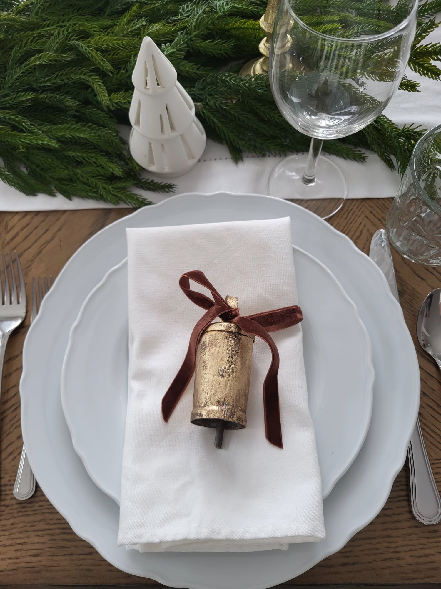 christmas bell ornament in table styling